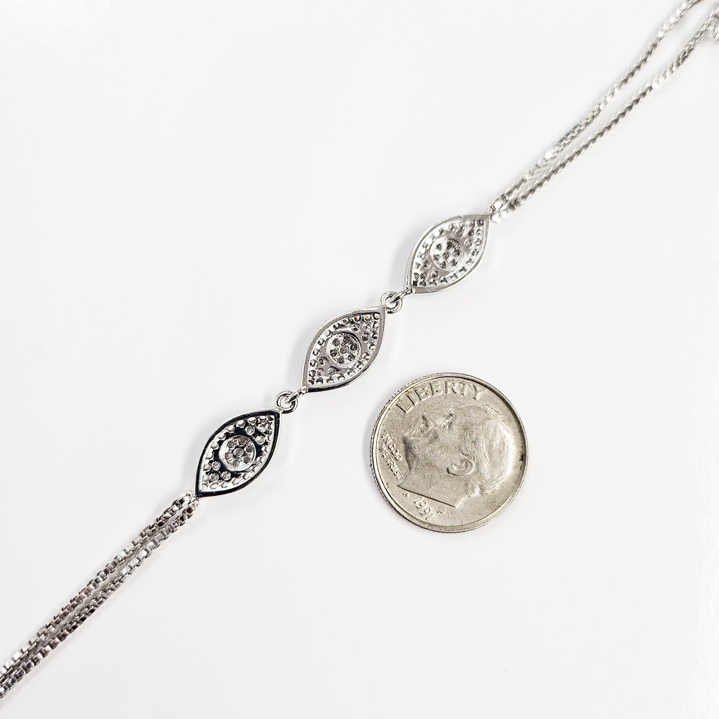 Twinkling Eye White Gold Plated Hand Chain