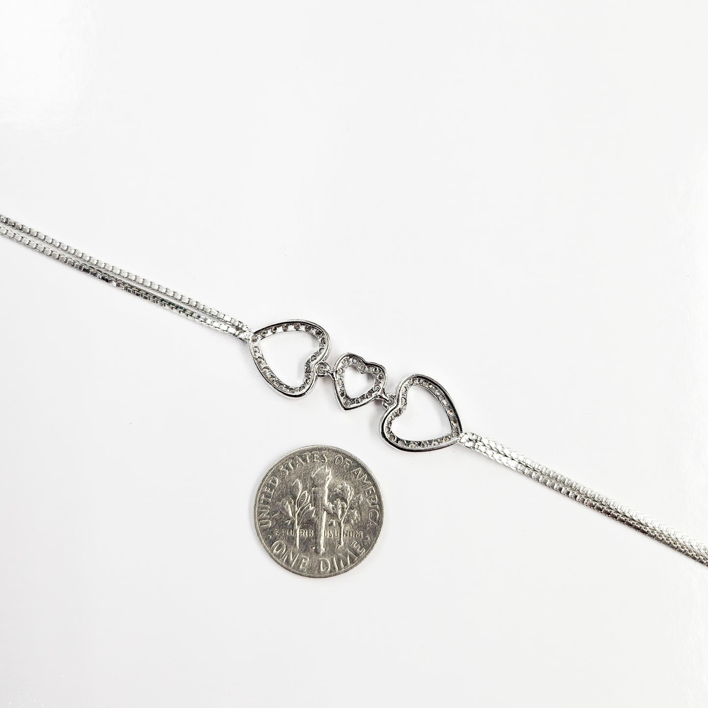 Connected Hearts Hand Chain in White Goldplated