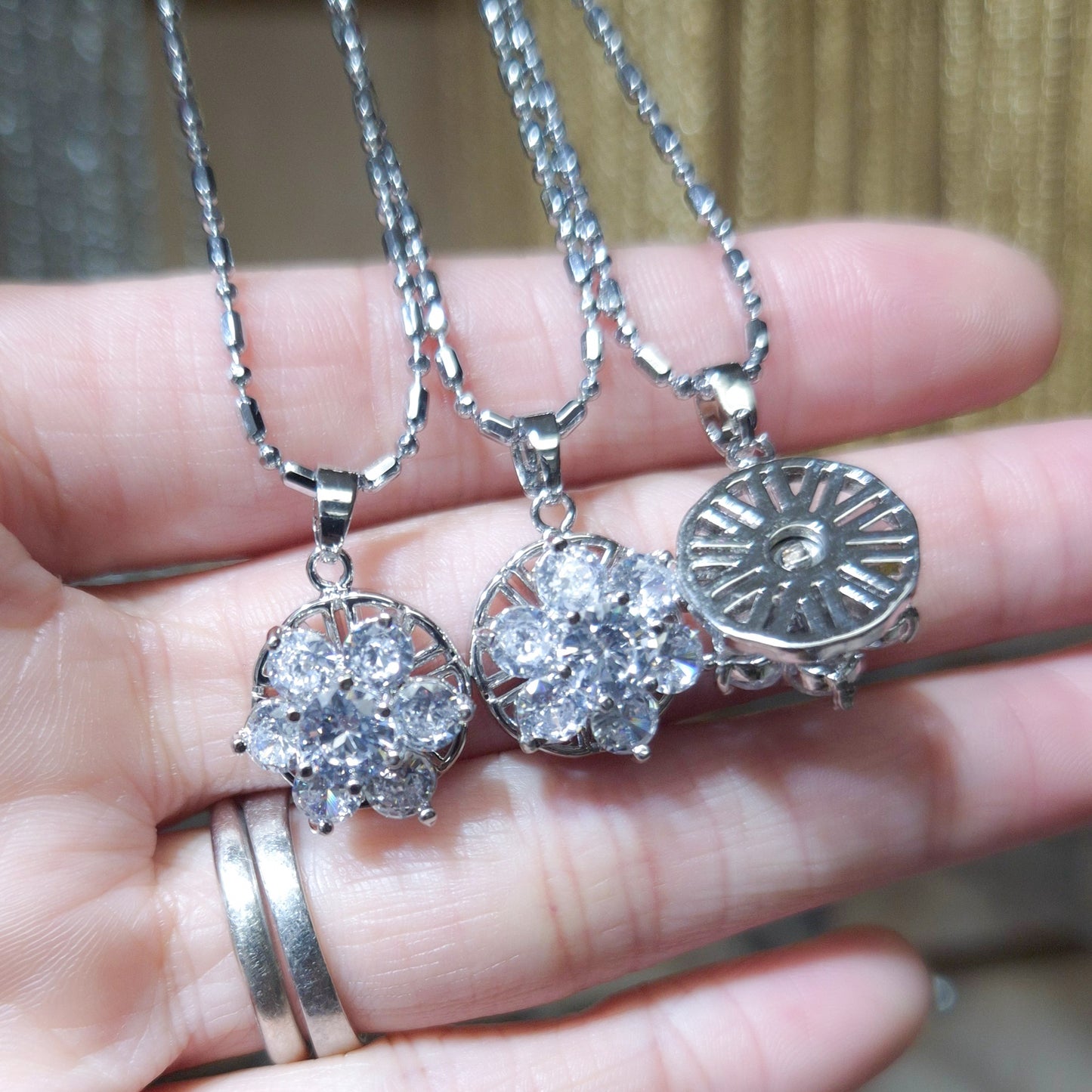 Sparkly Silver Flower Spinner Necklace