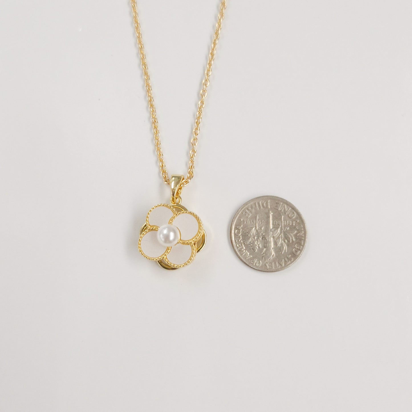 White Pearl Enamel Flower Spinner Necklace