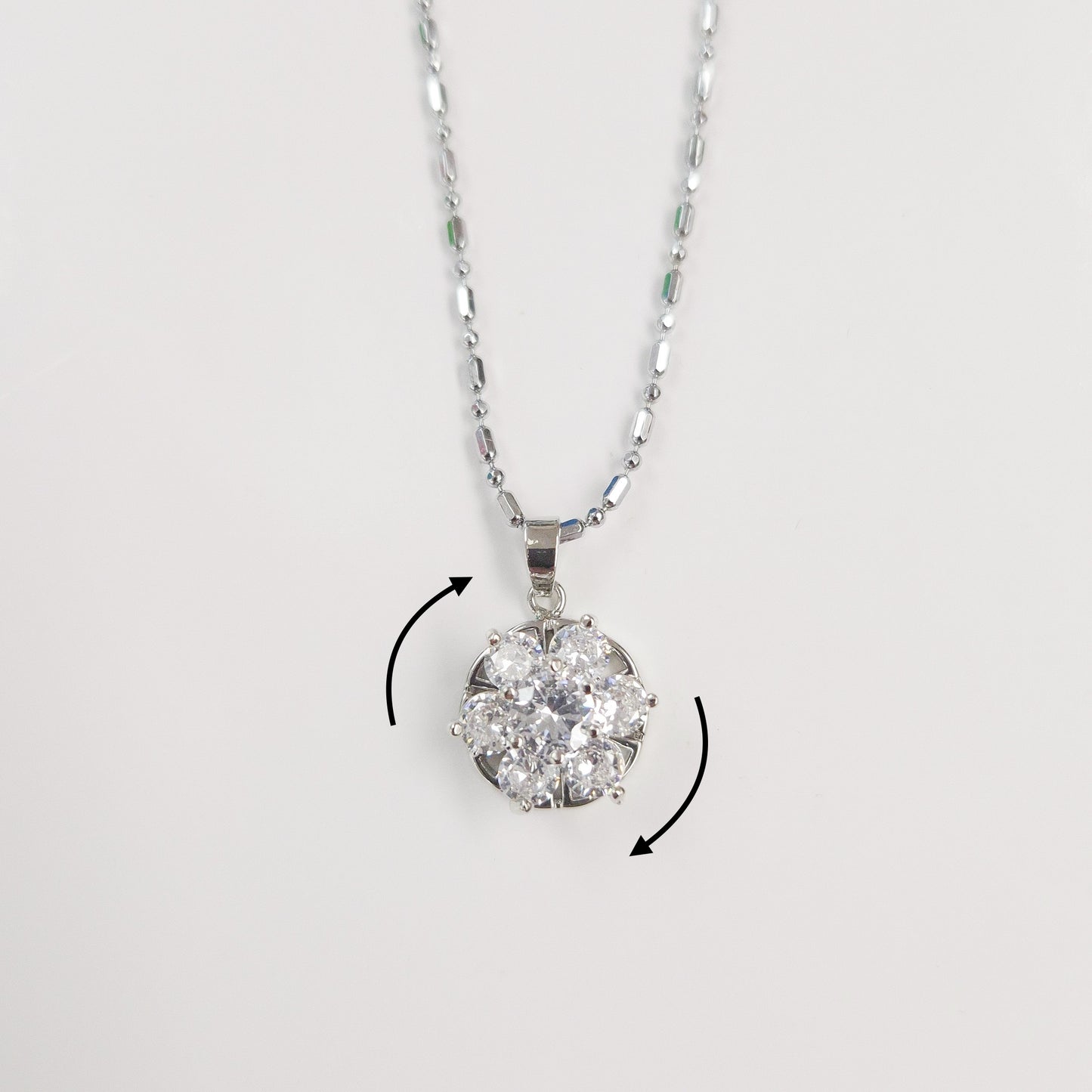 Sparkly Silver Flower Spinner Necklace