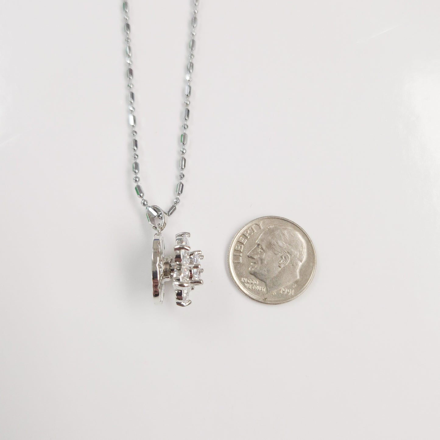 Sparkly Silver Flower Spinner Necklace