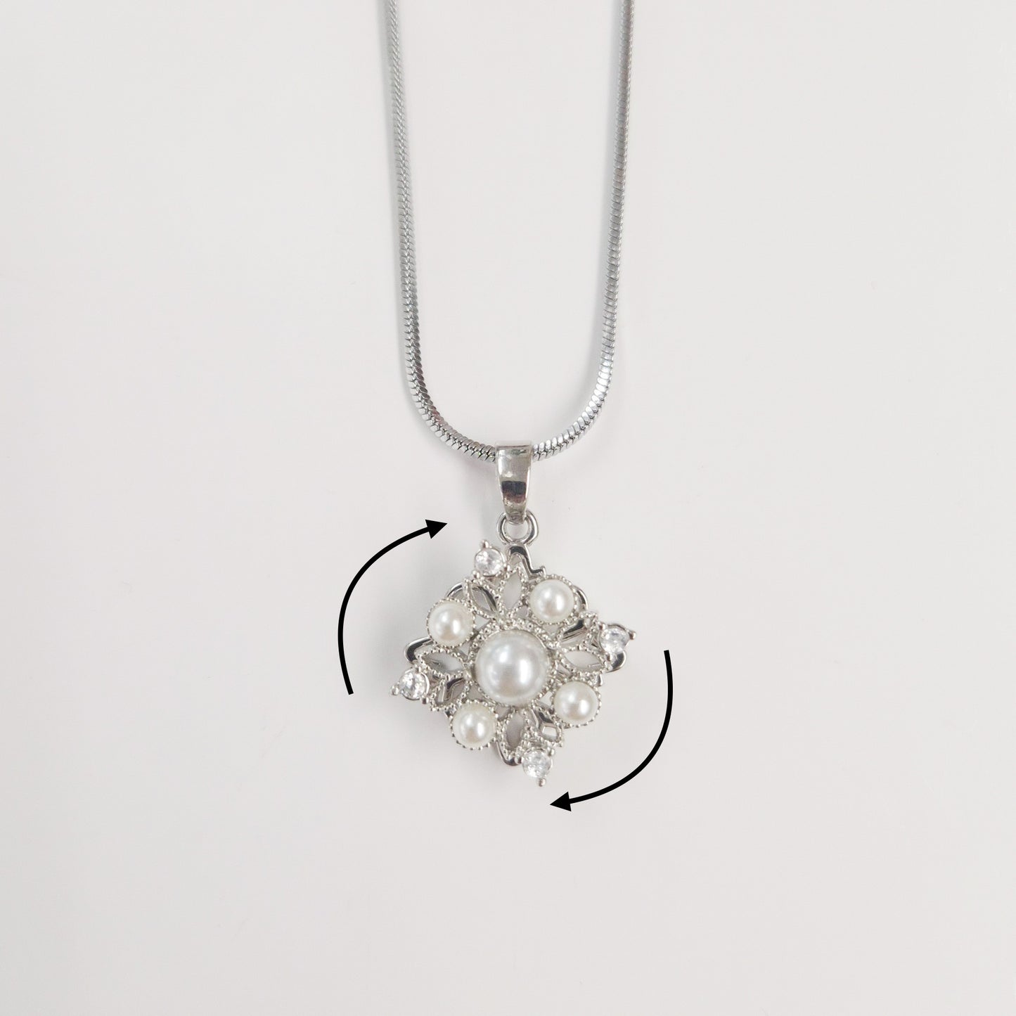 Pearl Snowflake Spinner Necklace