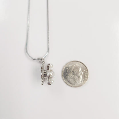 Pearl Snowflake Spinner Necklace