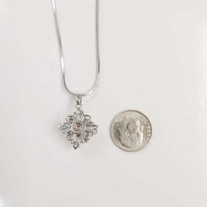 Pearl Snowflake Spinner Necklace