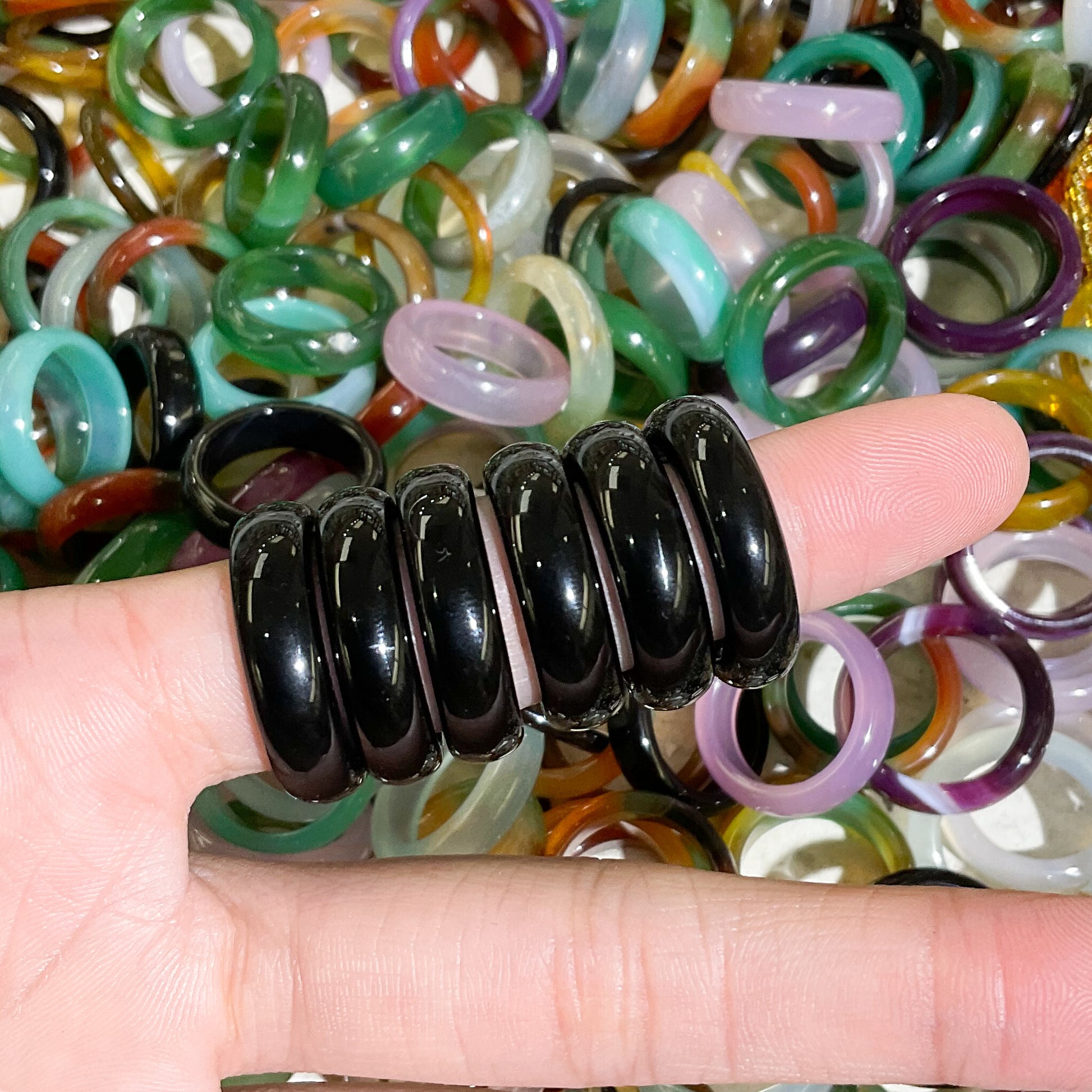 black agate rings modeled on finger