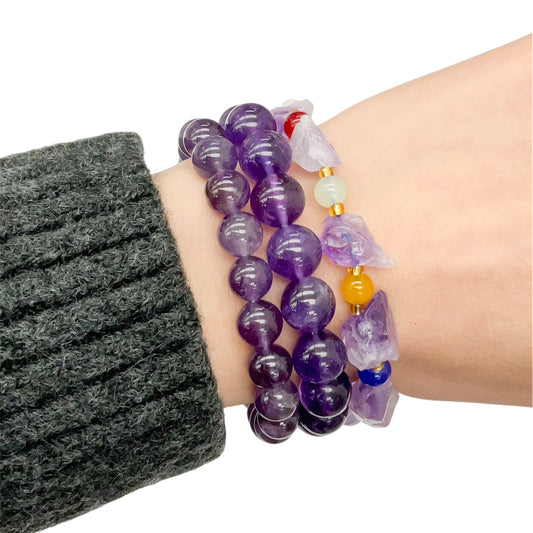 round beaded purple amethyst bracelets modeled on hand