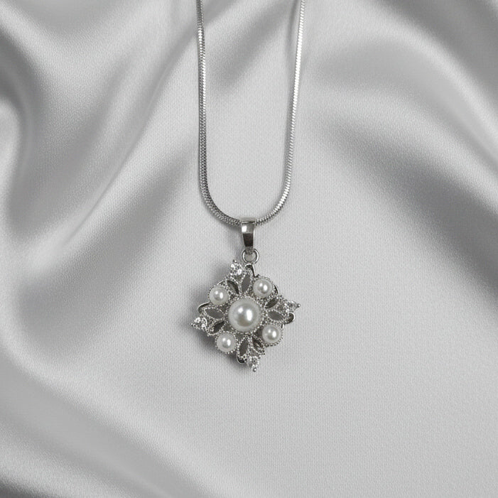 Pearl Snowflake Spinner Necklace