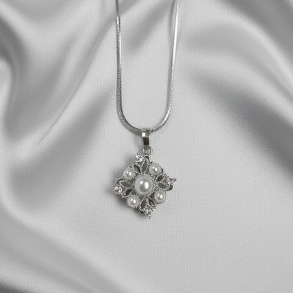 Pearl Snowflake Spinner Necklace